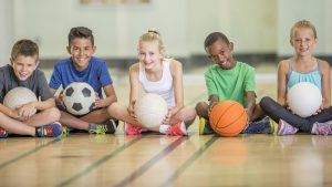 Kids Sitting at the Gym